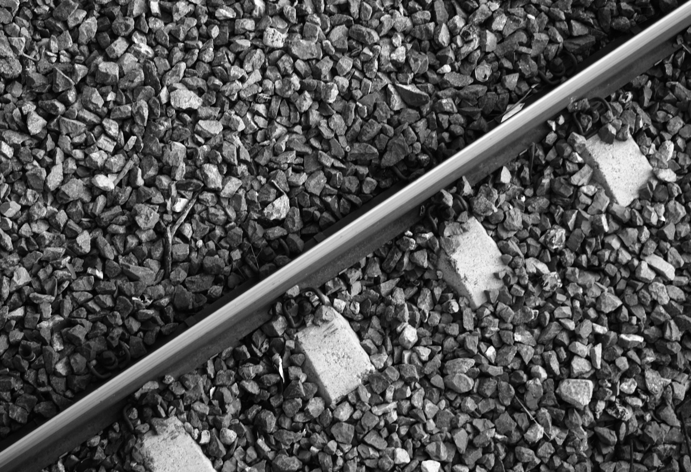 Close-up of Railway Track and Gravel Texture · Free Stock Photo