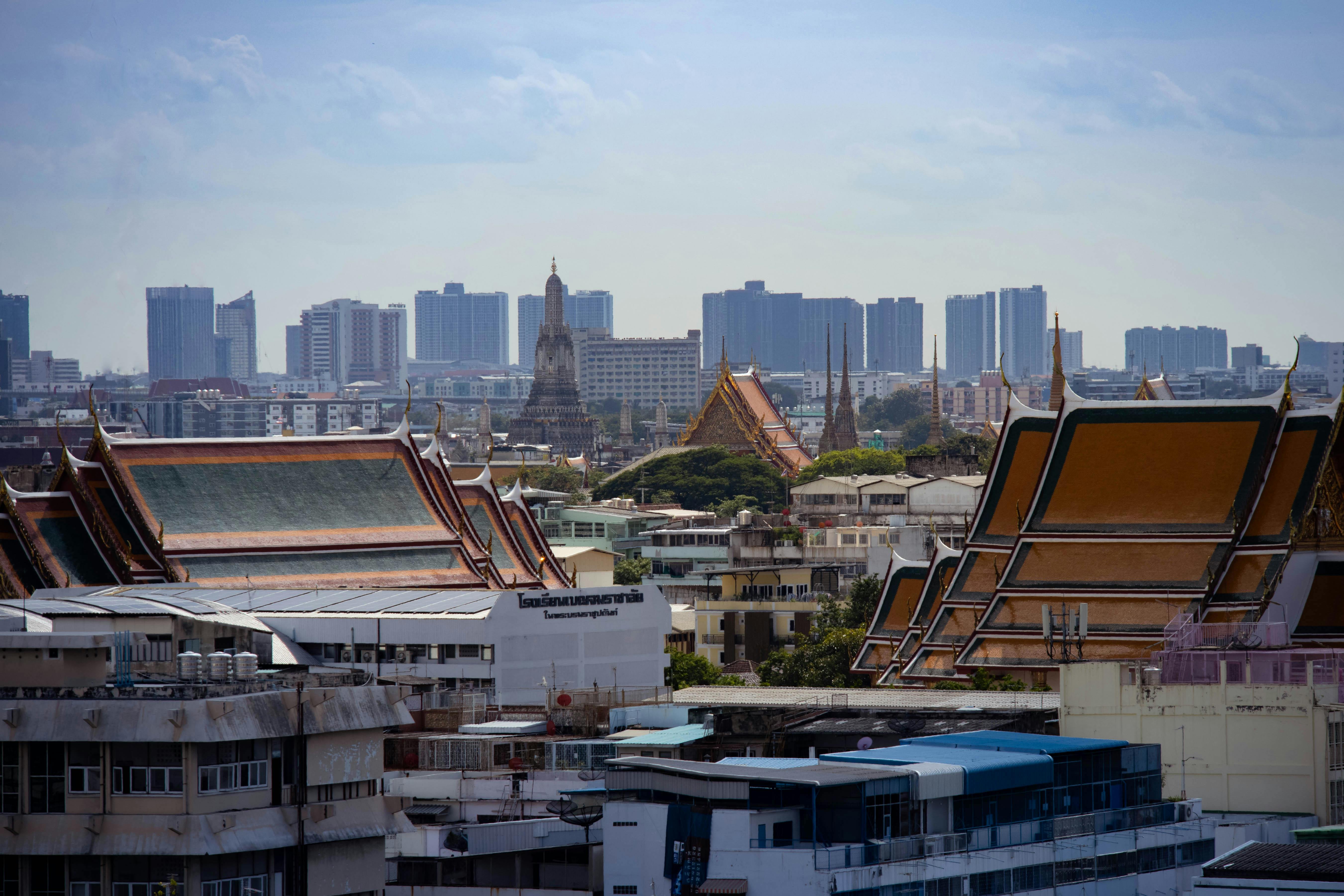 Bangkok Cityscape With Canals And Flooding, Ancient Temples And Modern Skyscrapers