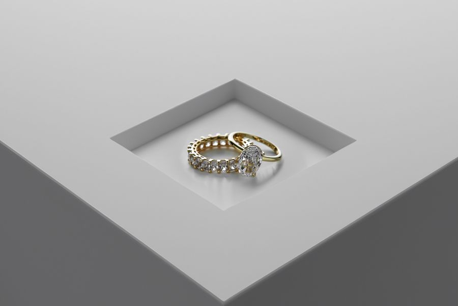 Gold and diamond rings on a minimalist surface