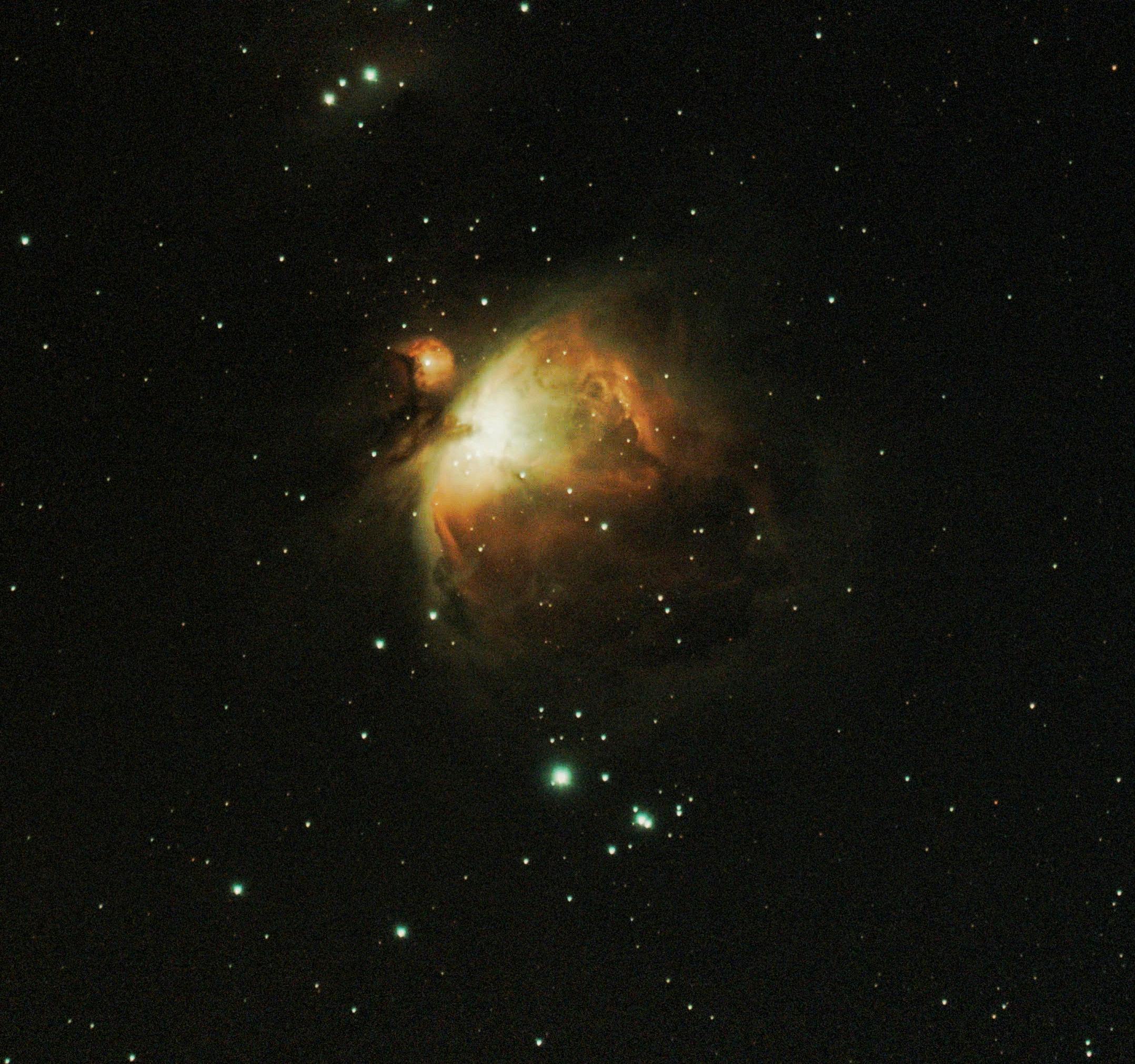 A breathtaking image of the Orion Nebula, showcasing its vivid colors and cosmic beauty.