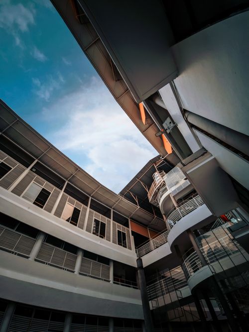 Free Dynamic urban architecture with a modern design captured from a unique angle. Stock Photo