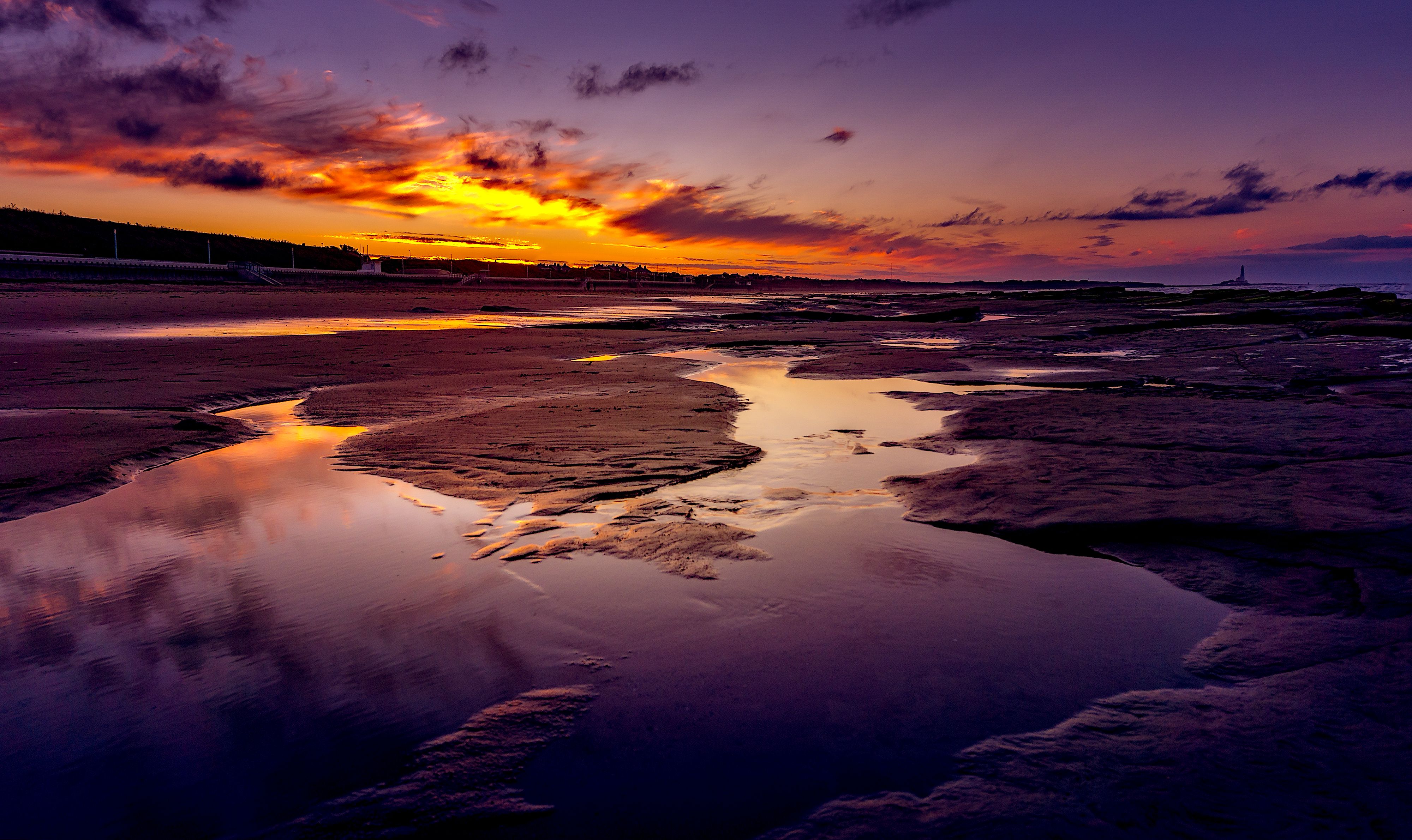 Stunning Sunset Over a Serene Beach Landscape · Free Stock Photo