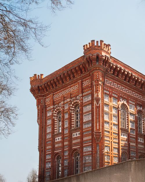 Free An ornate red church in Istanbul, Türkiye, featuring classic Byzantine architecture. Stock Photo