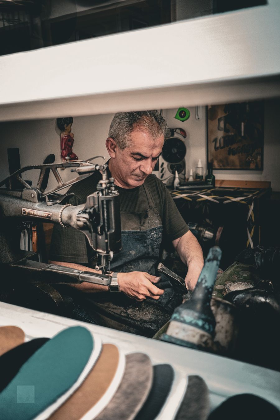 A closing machine being operated in the workshop