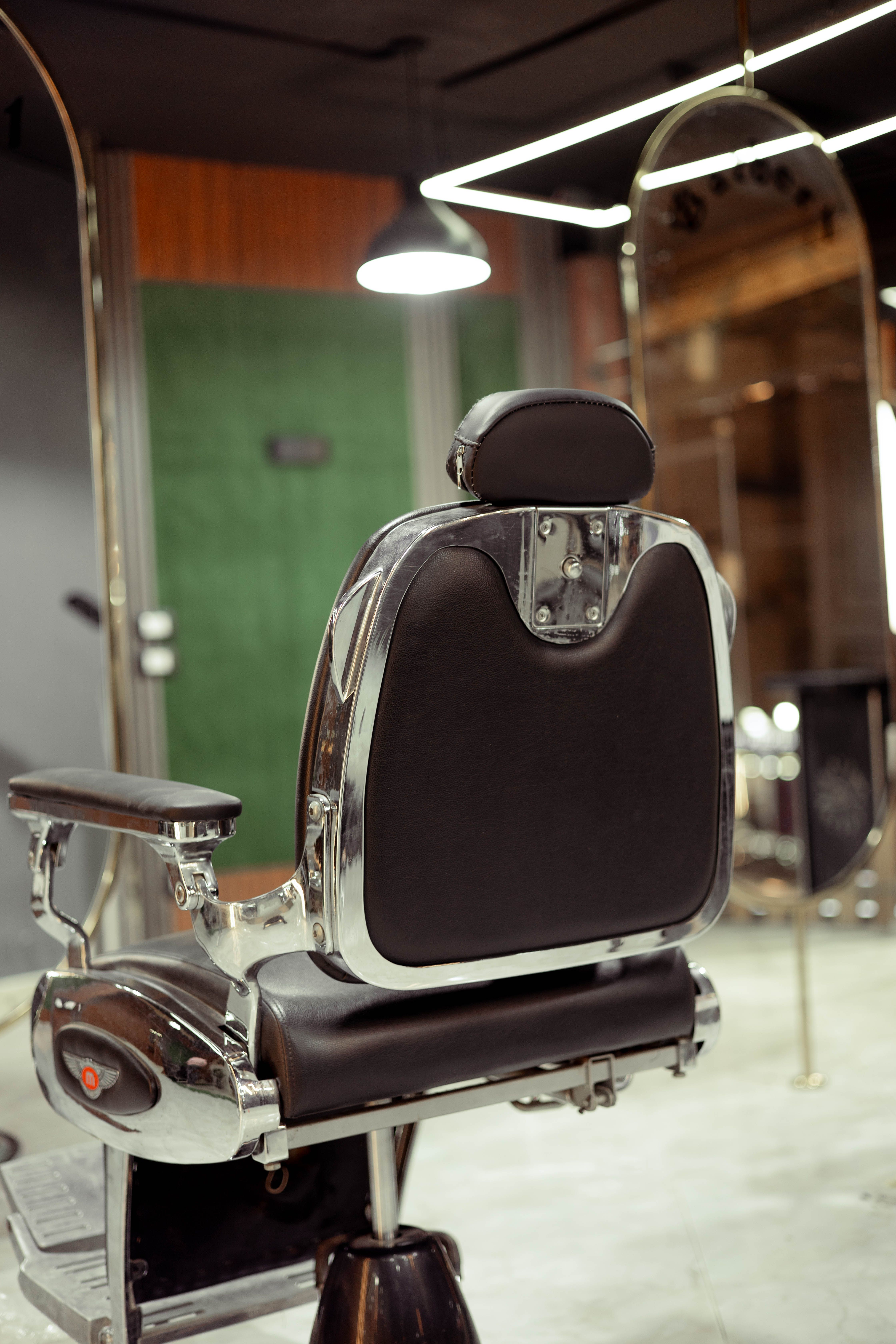 Vintage Style Barber Chair in Modern Barbershop · Free Stock Photo