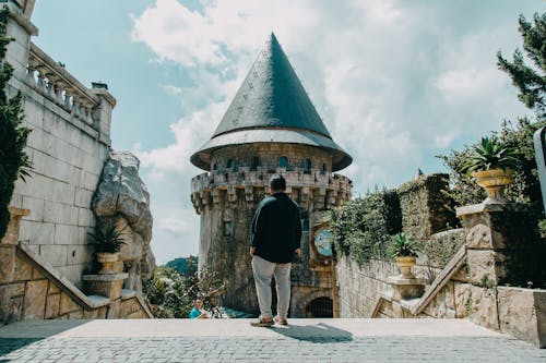 Free Man Staring at Castle Stock Photo