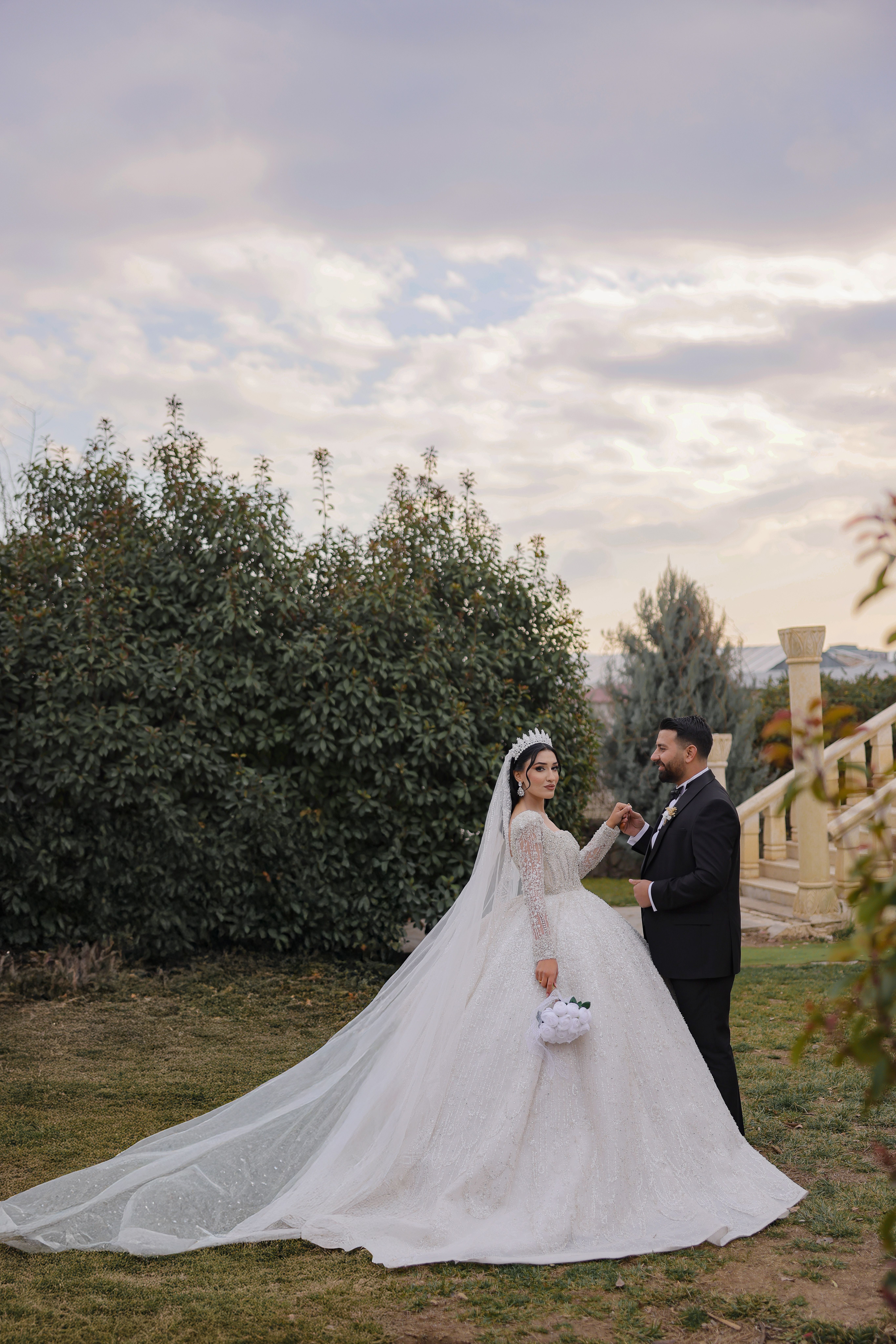 romantic-outdoor-wedding-couple-in-elegant-attire-free-stock-photo