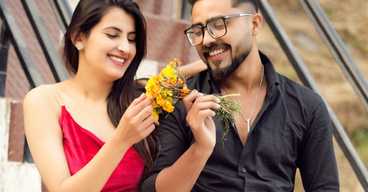 Young Couple Enjoying A Romantic Moment Outdoors Free Stock Photo young-couple-enjoying-a-romantic-moment-outdoors-free-stock-photo