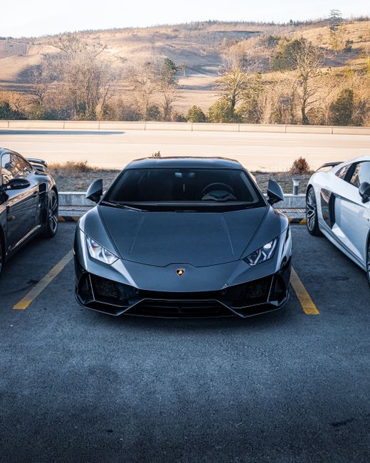 Stunning view of a Lamborghini Huracan parked in Ankara with scenic background.