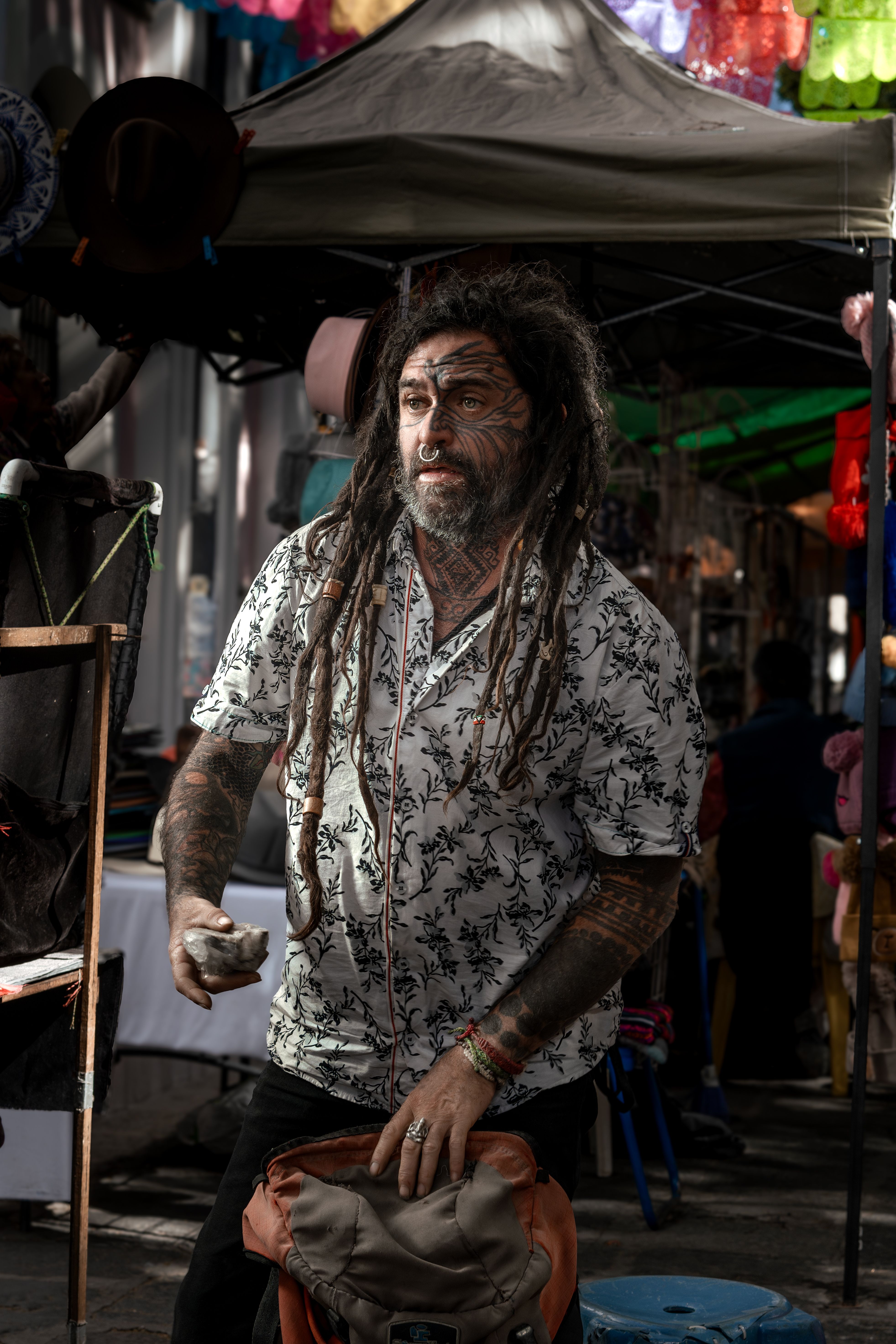 Street Portrait of Man with Dreadlocks in Market · Free Stock Photo