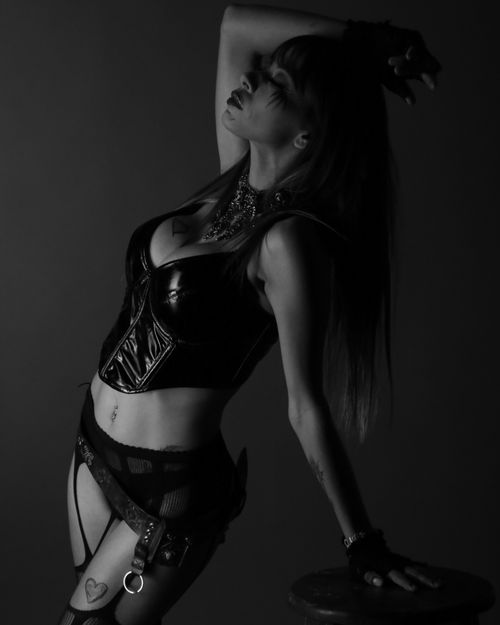 Free Artistic black and white portrait of a woman in leather, showcasing edgy fashion. Stock Photo