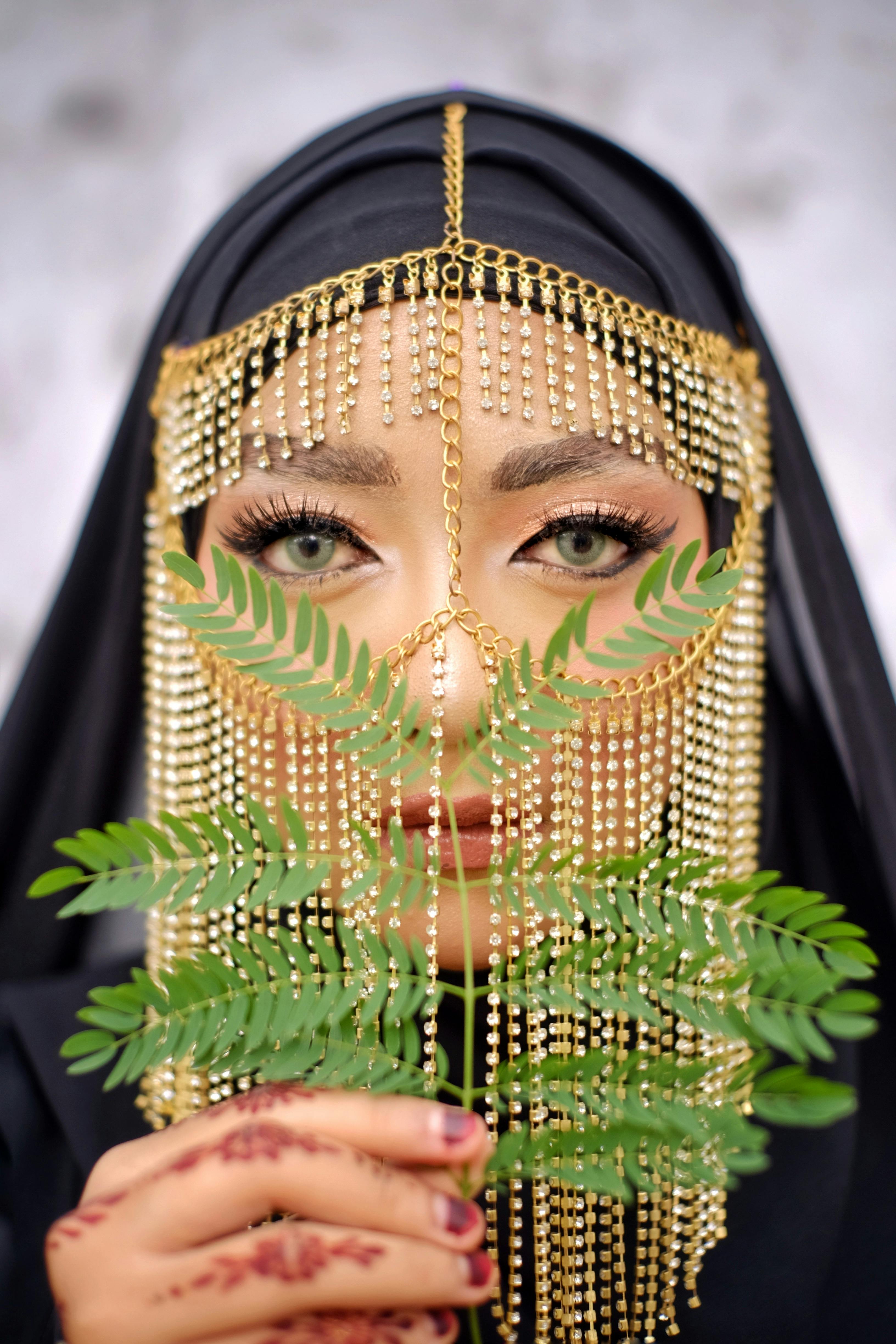 elegant portrait with fern and gold jewelry