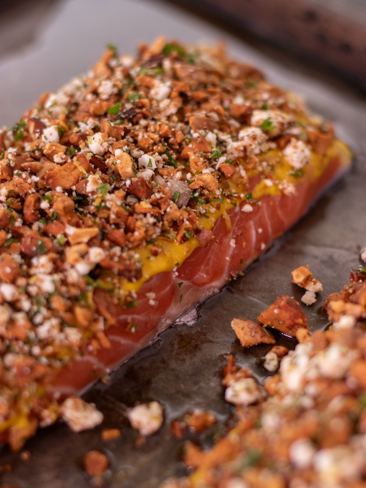 Herb crusted baked salmon on a sheet pan