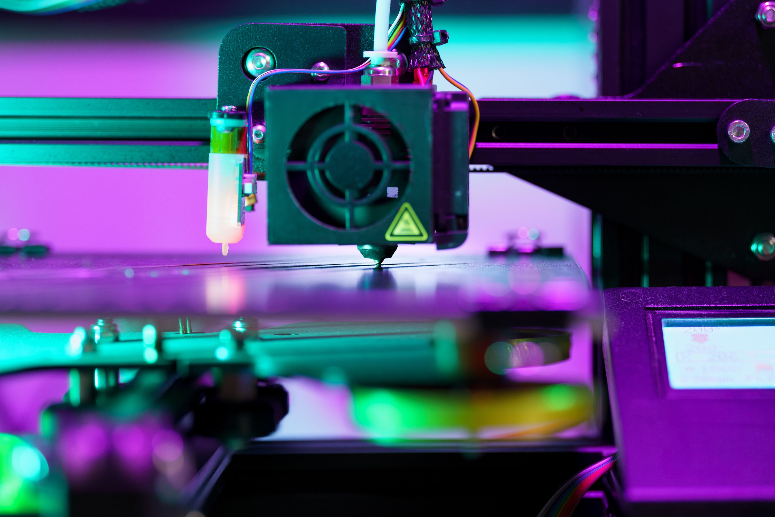 Close-Up of a Futuristic 3D Printer in Action · Free Stock Photo