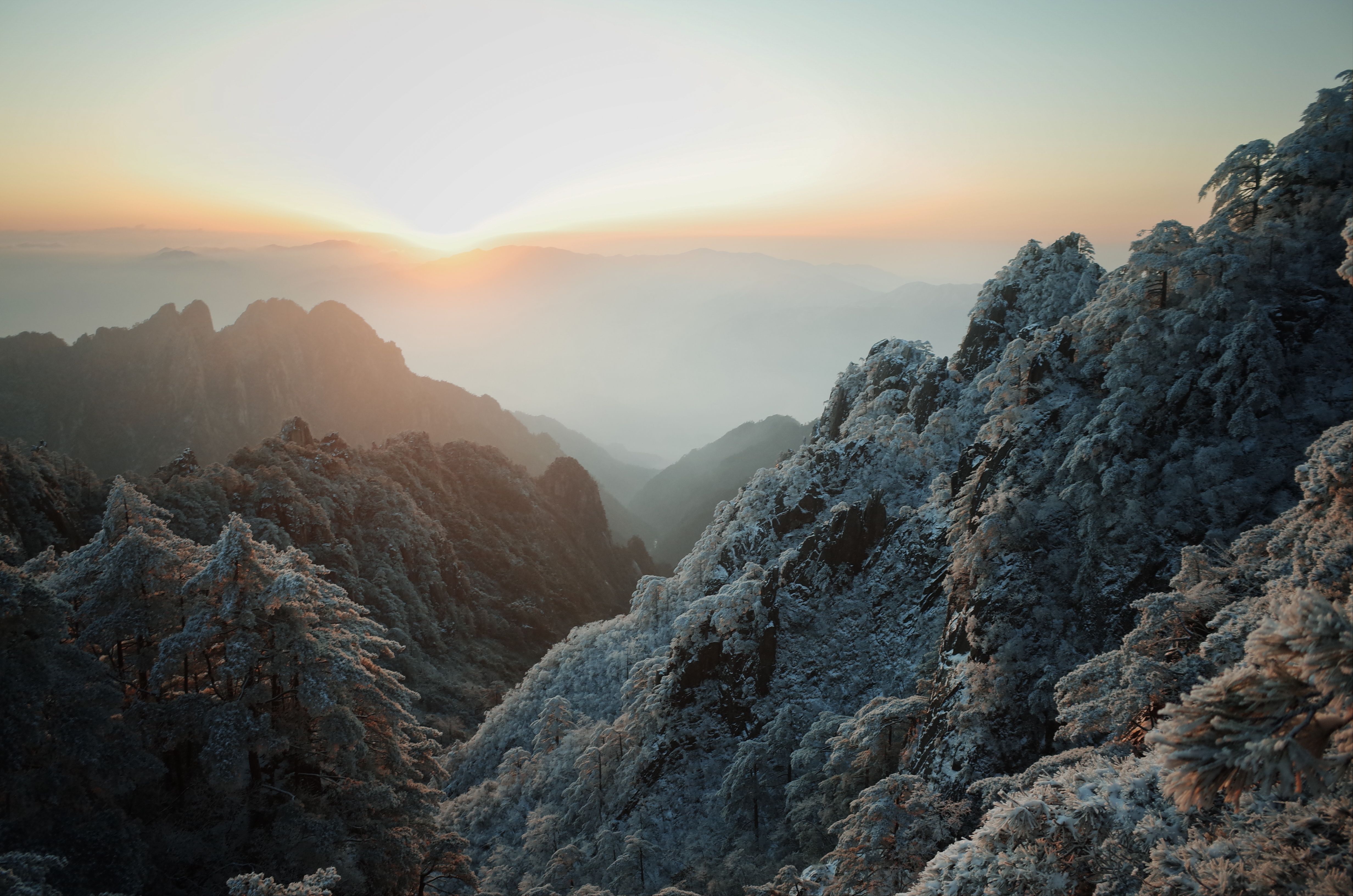 Majestic Winter Sunrise Over Snowy Mountains · Free Stock Photo