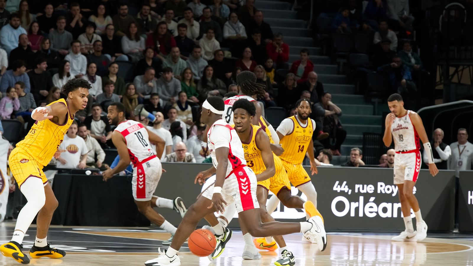 Representative photograph of players in an indoor basketball arena; not the Philadelphia 76ers–Milwaukee Bucks game