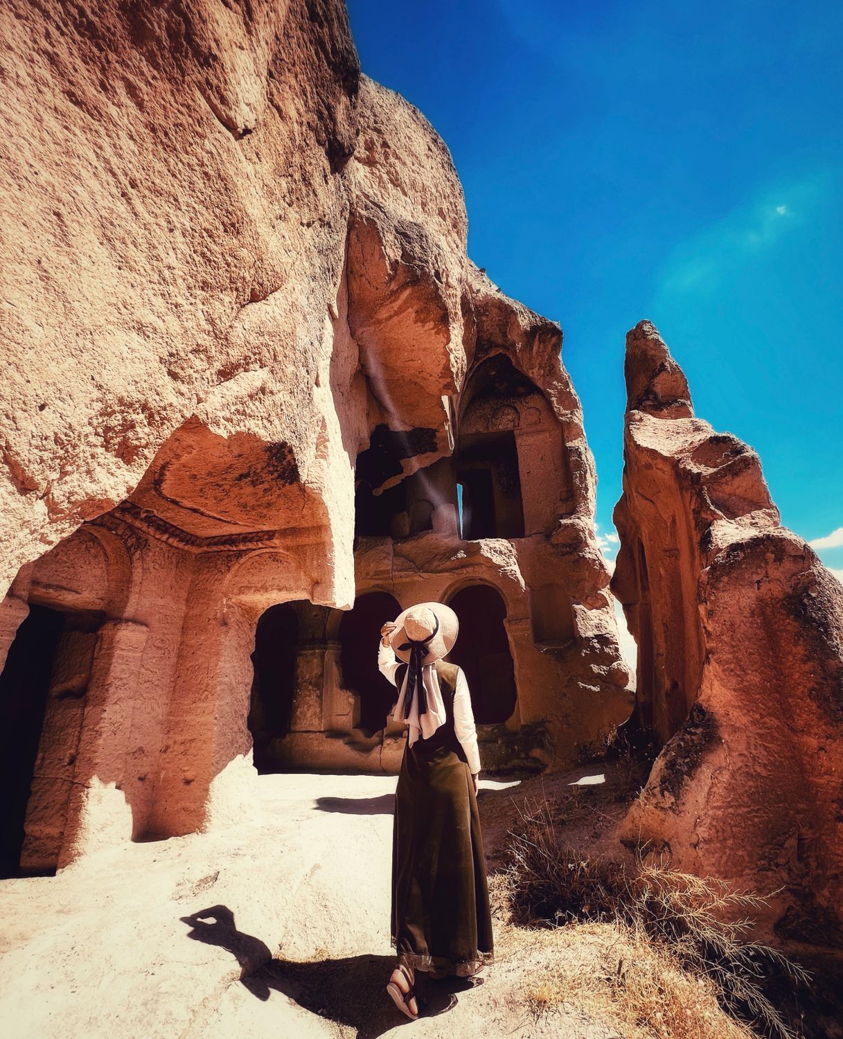 Traveler Exploring Ancient Rock Formations · Free Stock Photo