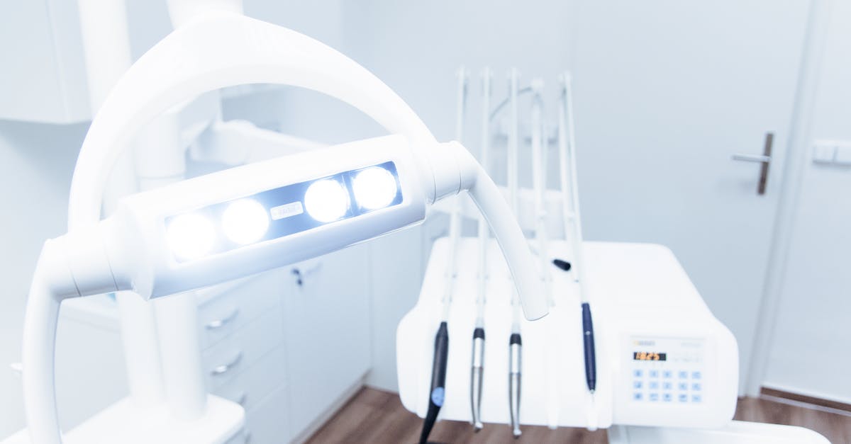 White Dental Equipment Near Wall