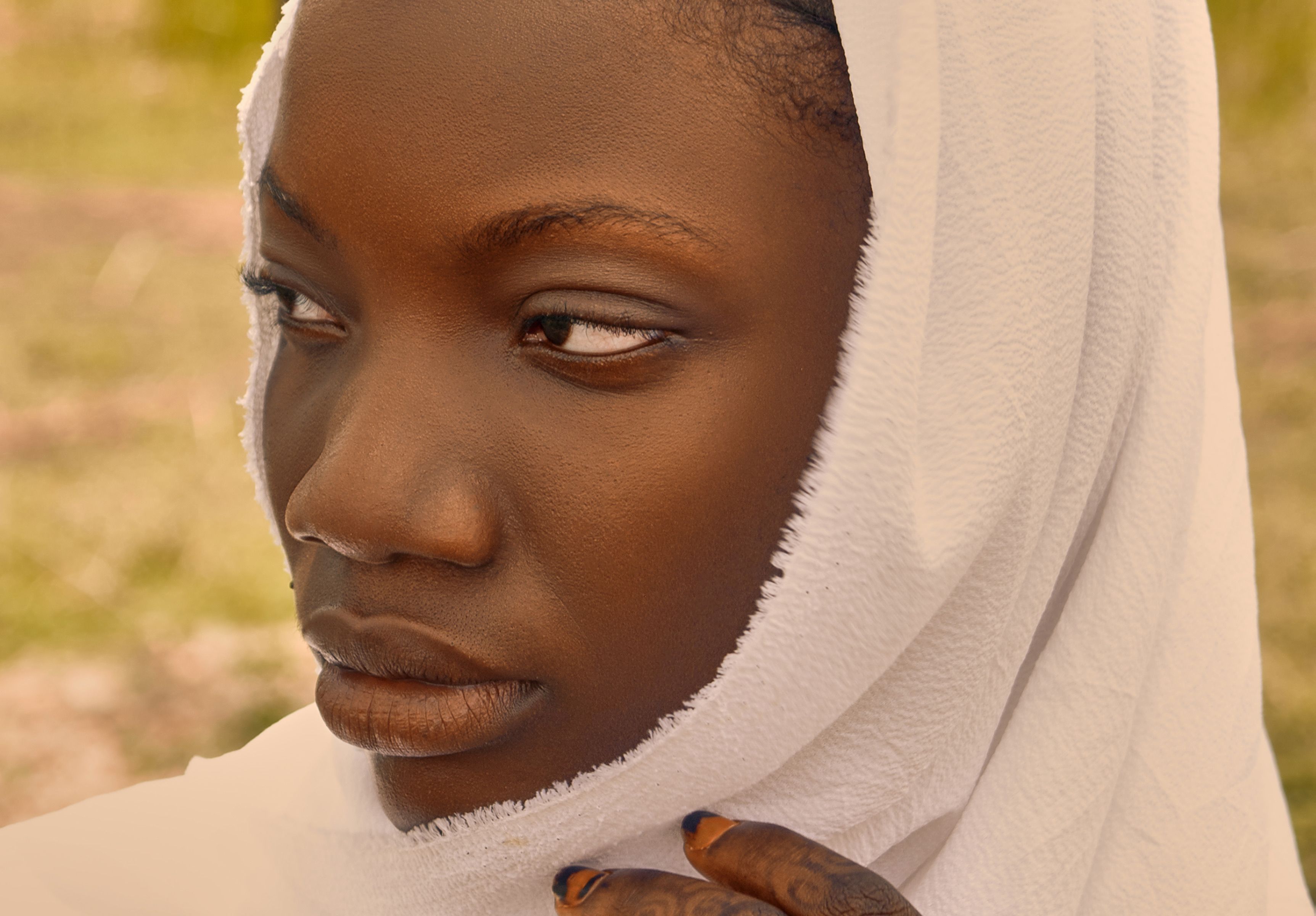 Serene Portrait of Woman in White Hijab · Free Stock Photo