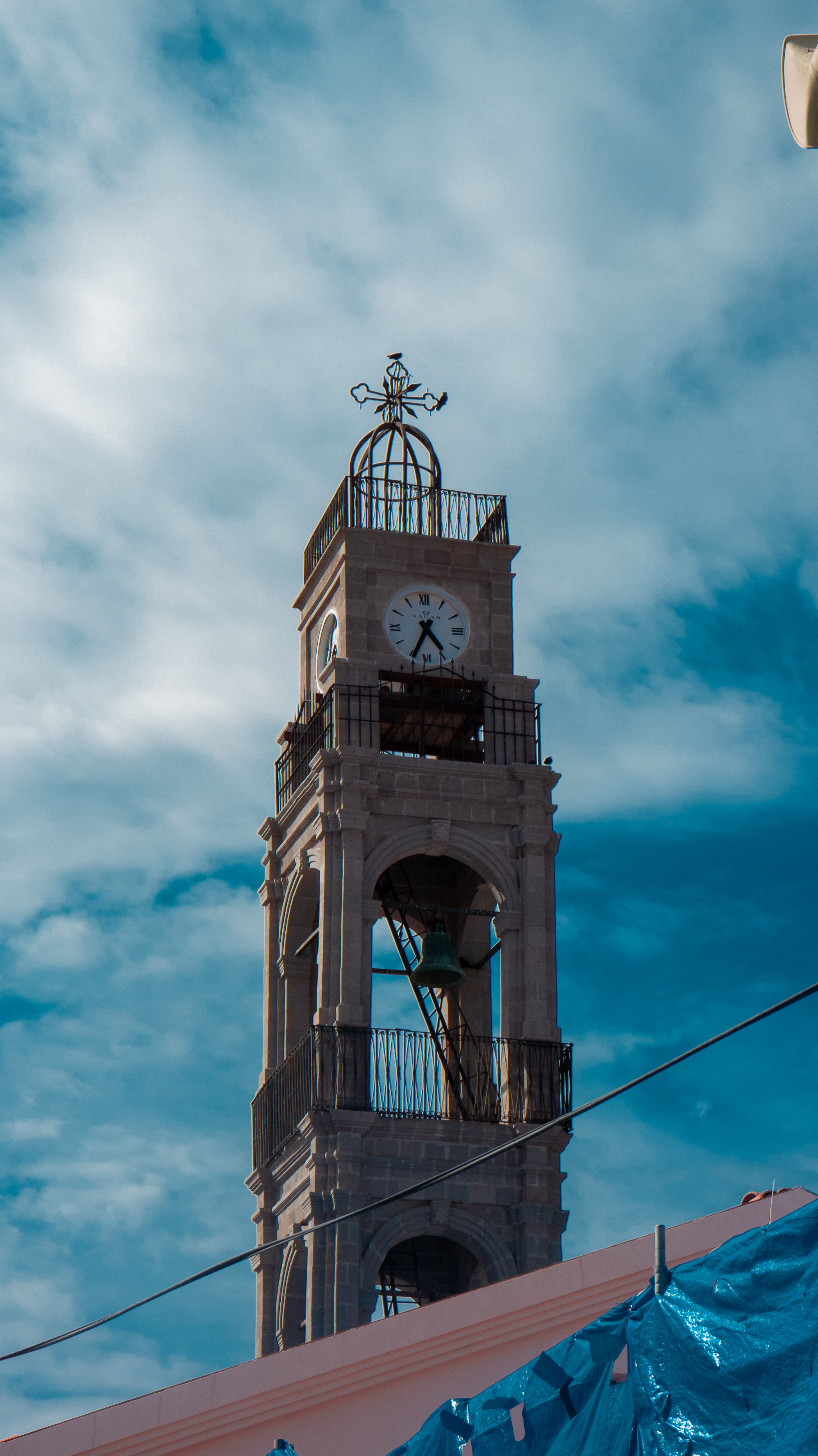 Historic Clock Tower against a Blue Sky · Free Stock Photo