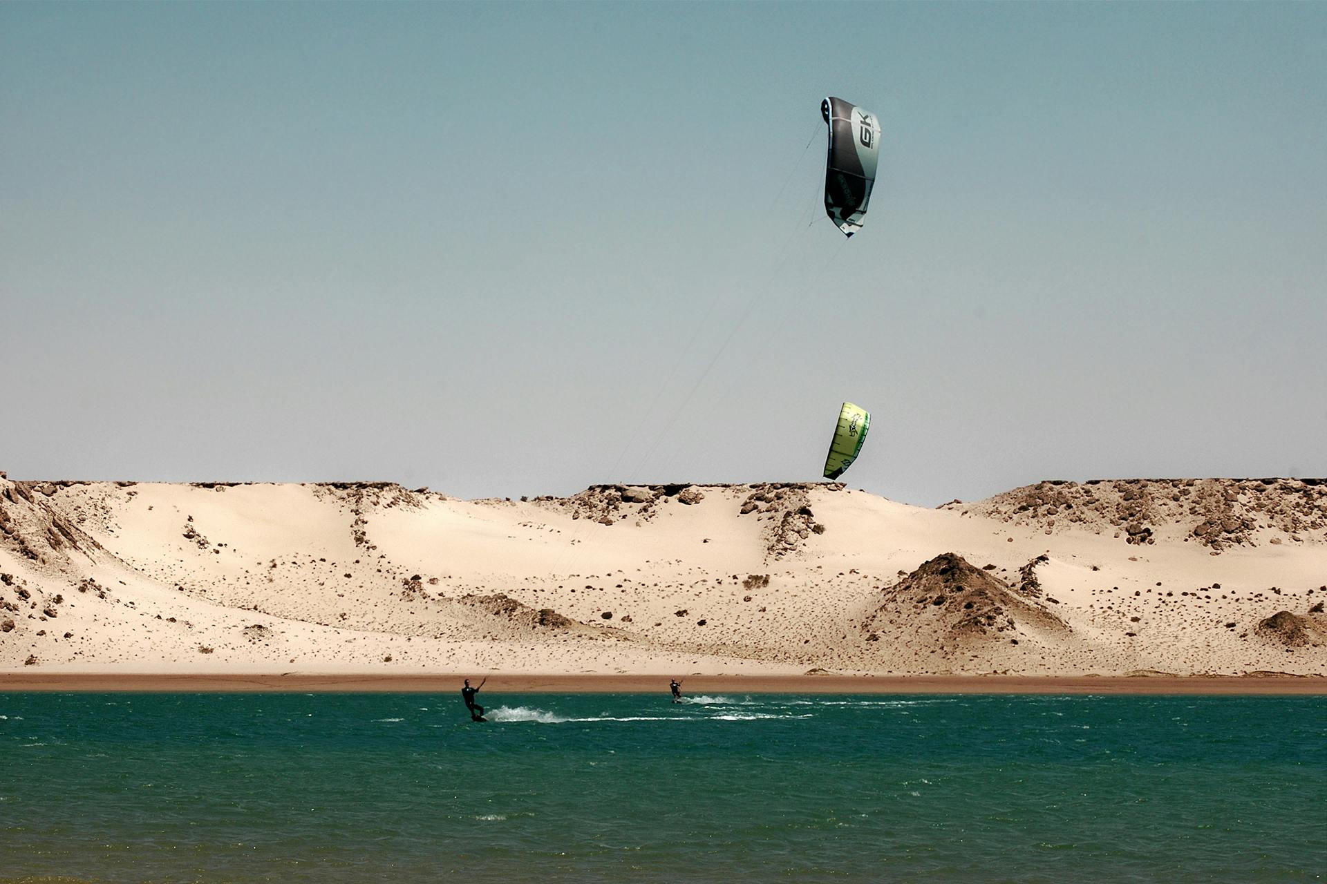 Experience thrilling kitesurfing against Dakhla’s stunning desert and lagoon backdrop. Perfect for adventure seekers.