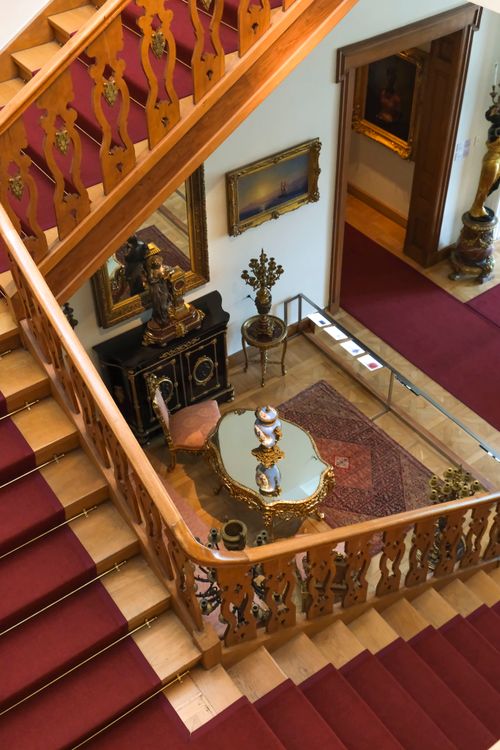 Free Ornate interior staircase and furnishings in a historical İstanbul mansion. Stock Photo