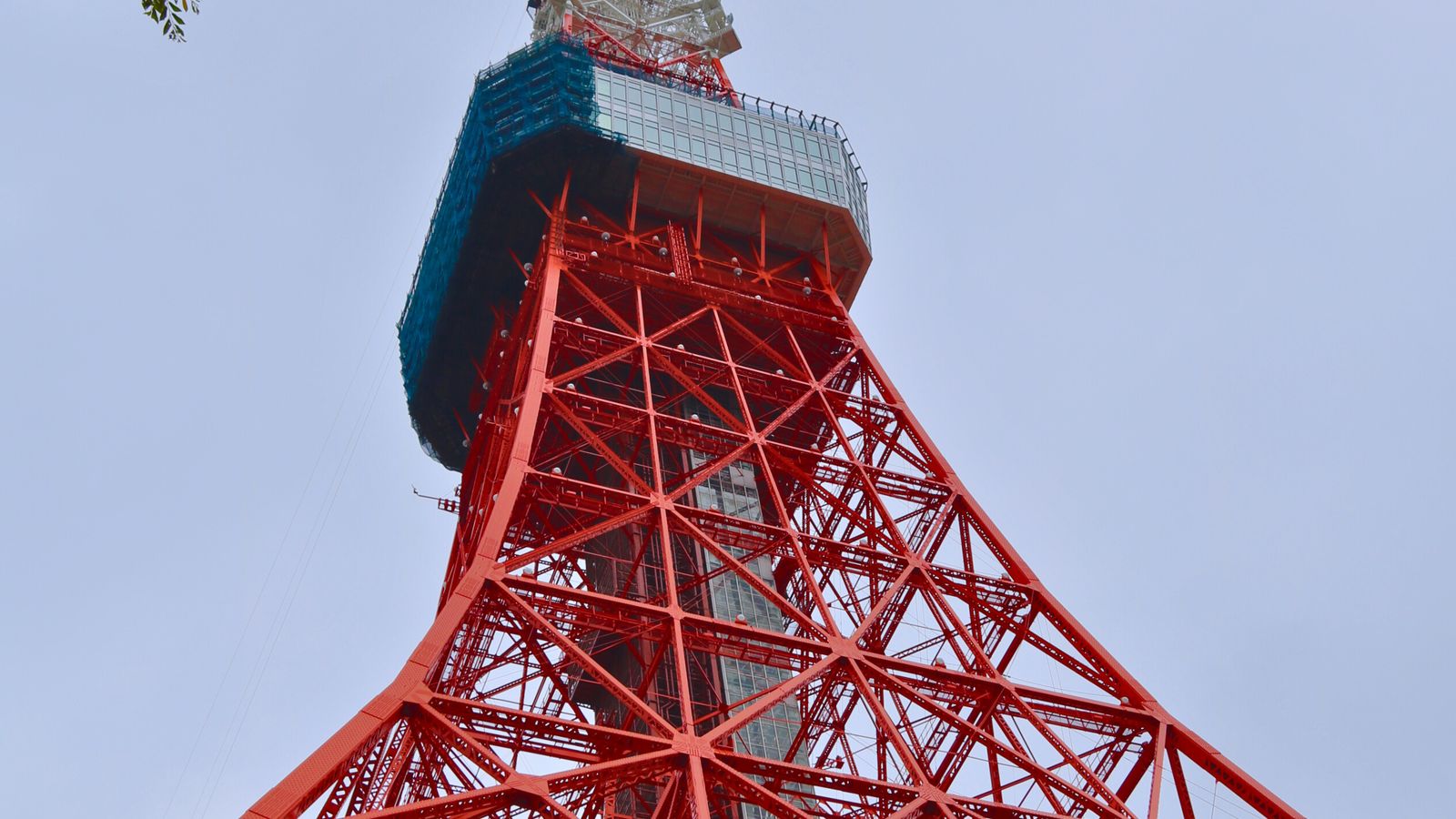 Tokyo Tower above Minato City in Tokyo, a real photo of the city where the Godzilla franchise began in 1954, used as an illustrative image for Godzilla Minus Zero