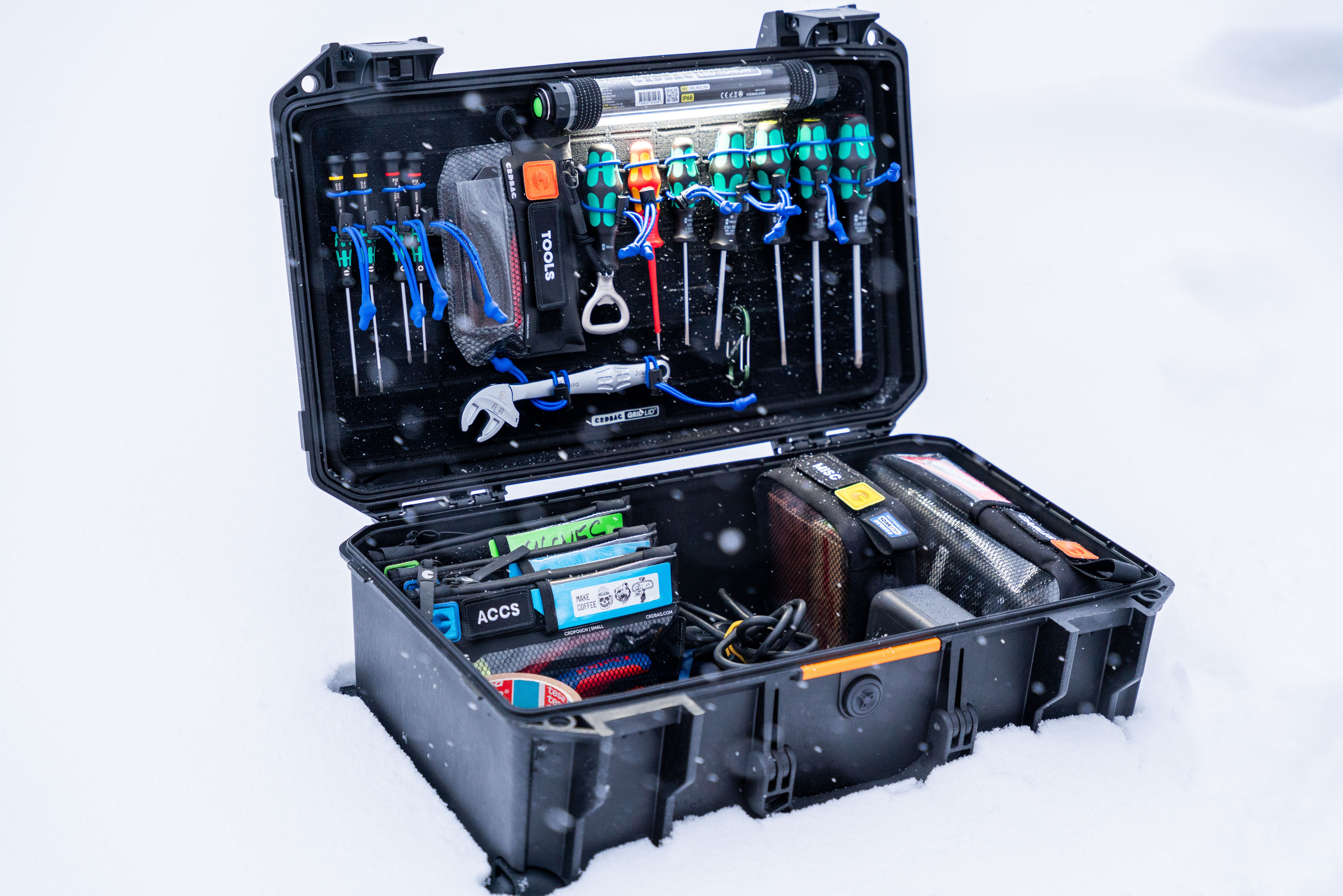 Professional Tool Case Open in Snowy Environment · Free Stock Photo