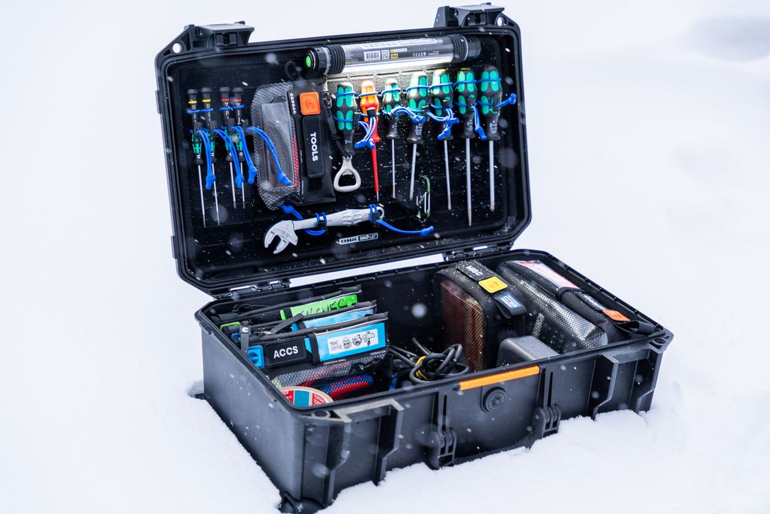 Professional Tool Case Open in Snowy Environment · Free Stock Photo