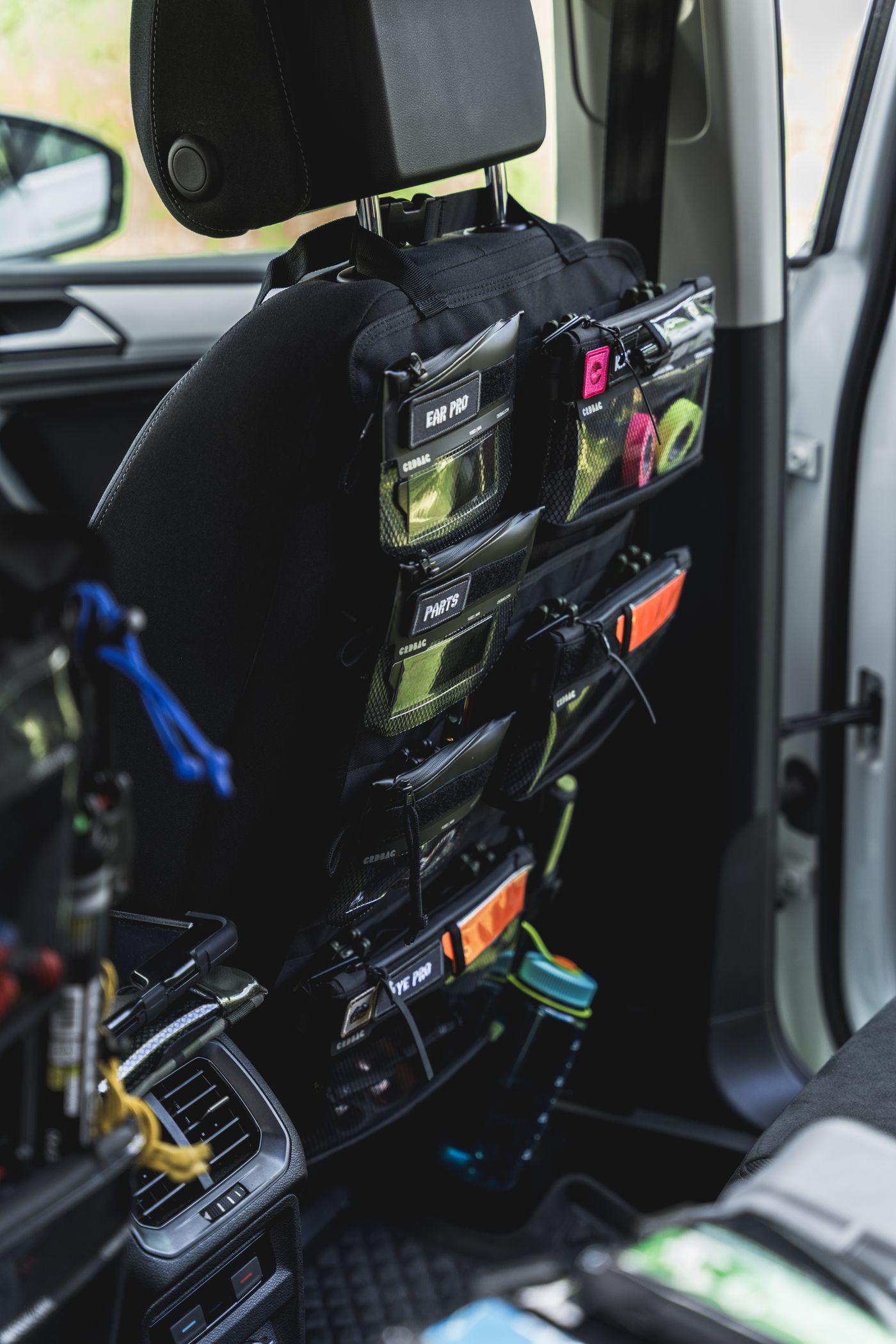Organized car backseat storage with gear bags