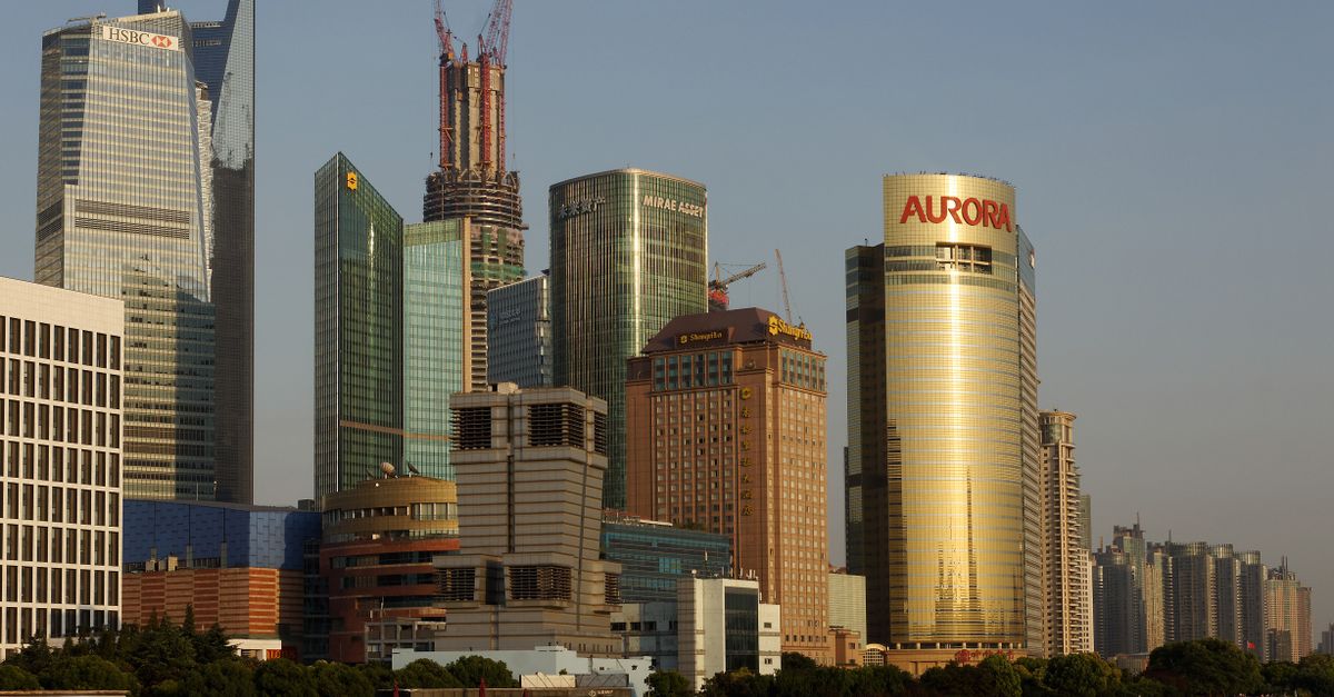 Stunning view of Shanghai's modern skyline featuring iconic skyscrapers and riverfront.