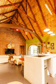 Bright rustic living space with wooden beams and modern amenities.