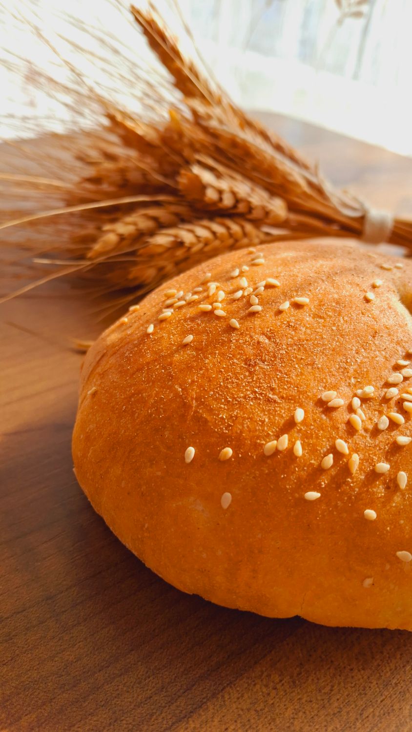 Fresh Sesame Seed Bread with Wheat Stalks · Free Stock Photo