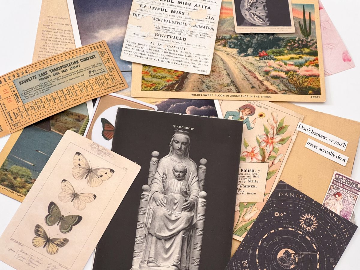 Baby shower invitation ideas with a flat lay of vintage postcards and old ephemera