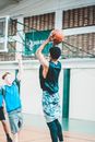Men Playing Basketball