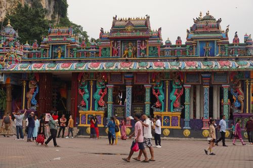 Free Colorful Sri Maha Mariamman Temple with diverse visitors in Malaysia. Stock Photo