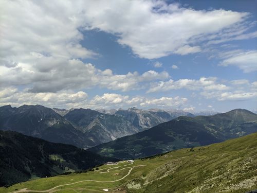 Free Breathtaking view of the Alps under a partly cloudy sky, ideal for nature lovers. Stock Photo