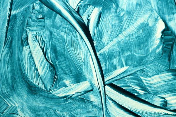 Teal paint strokes on a light ground &mdash; photo by Landiva Weber on Pexels