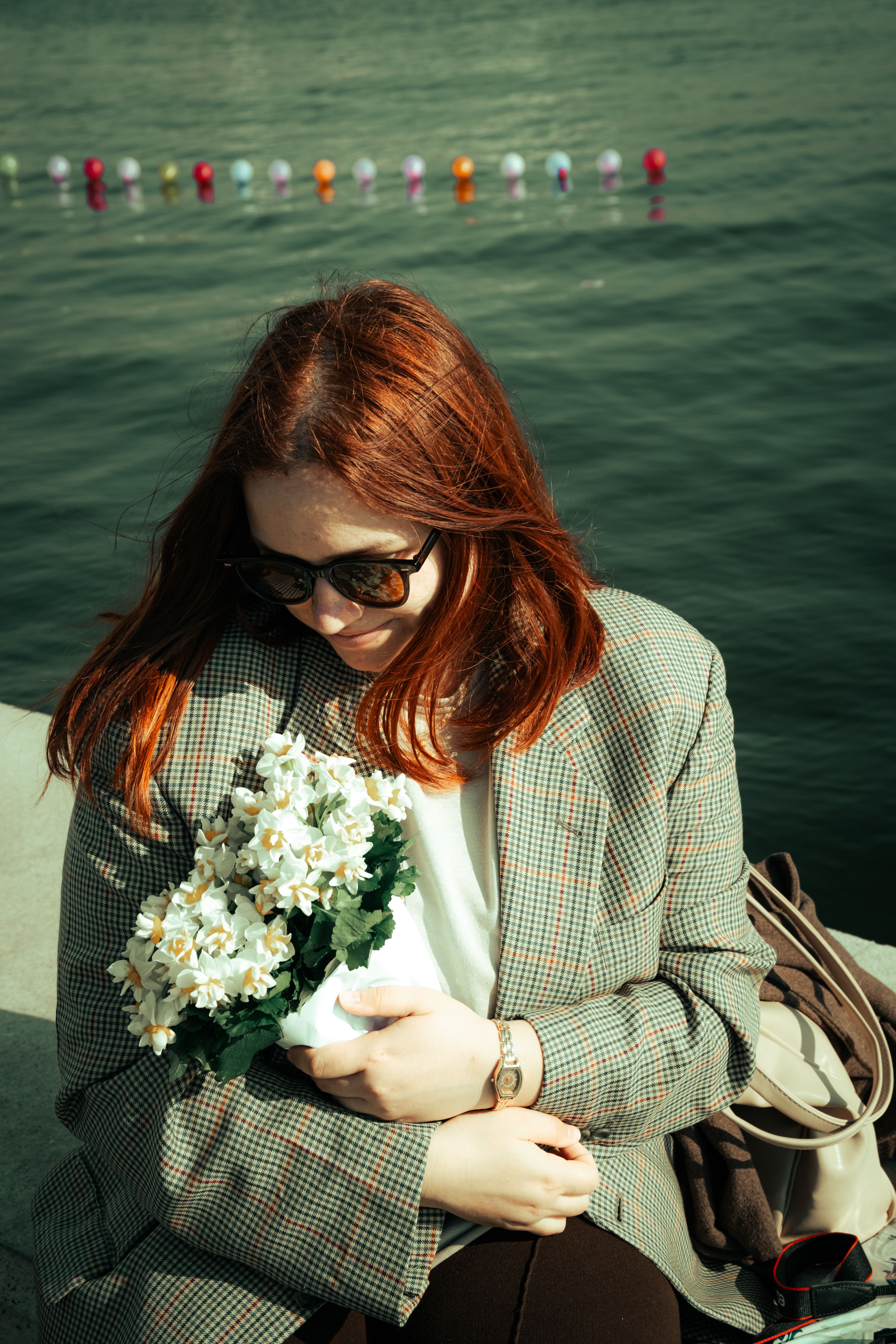 Woman with Bouquet by İzmir Waterfront · Free Stock Photo