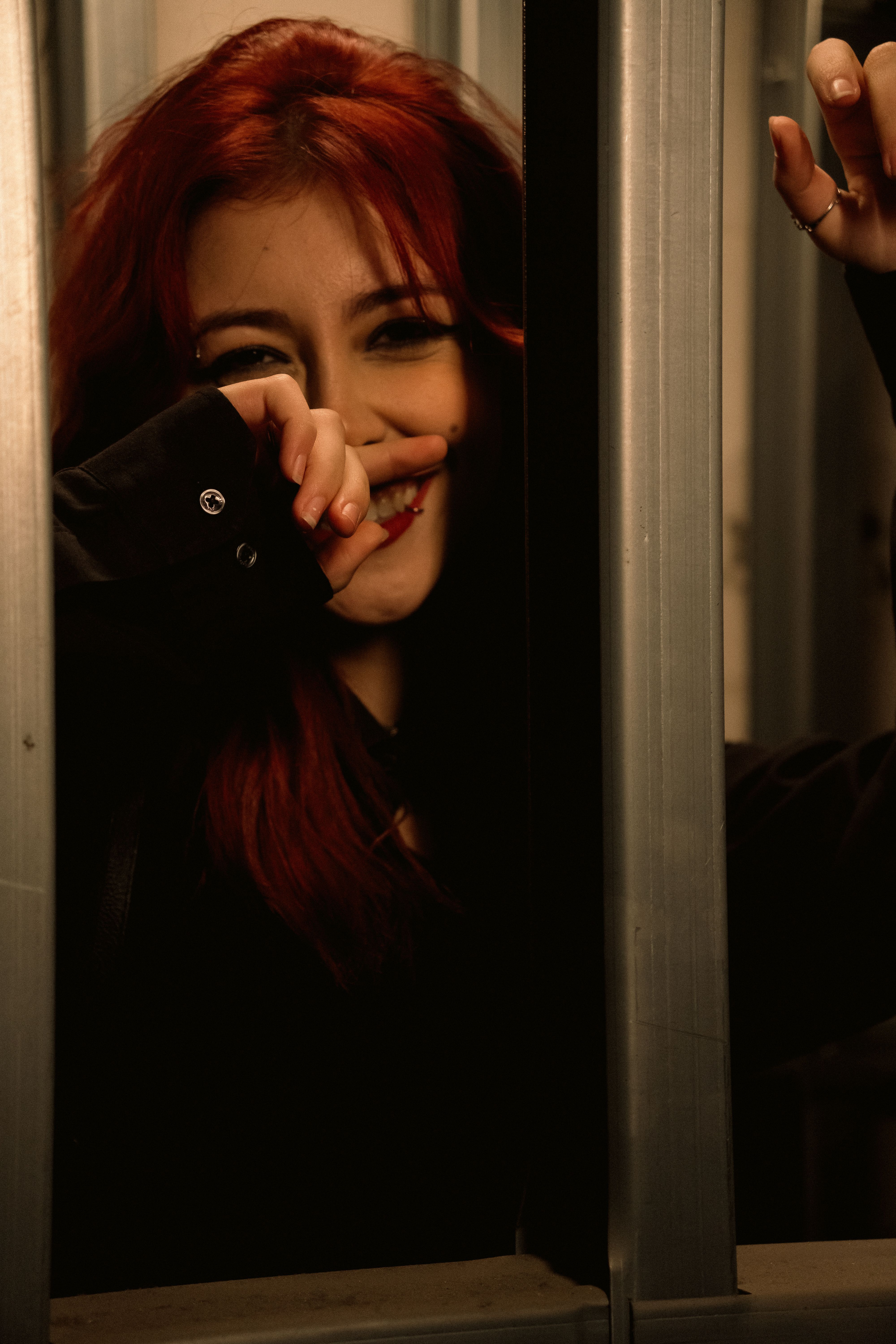Portrait of a Woman with Red Hair Smiling · Free Stock Photo