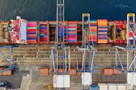 Top-view Photography of Cargo Ship With Intermodal Containers