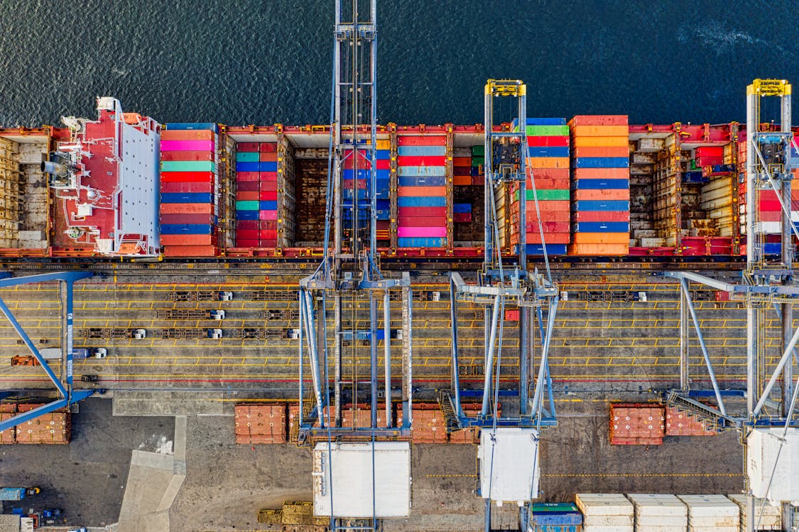 Free Top-view Photography of Cargo Ship With Intermodal Containers Stock Photo