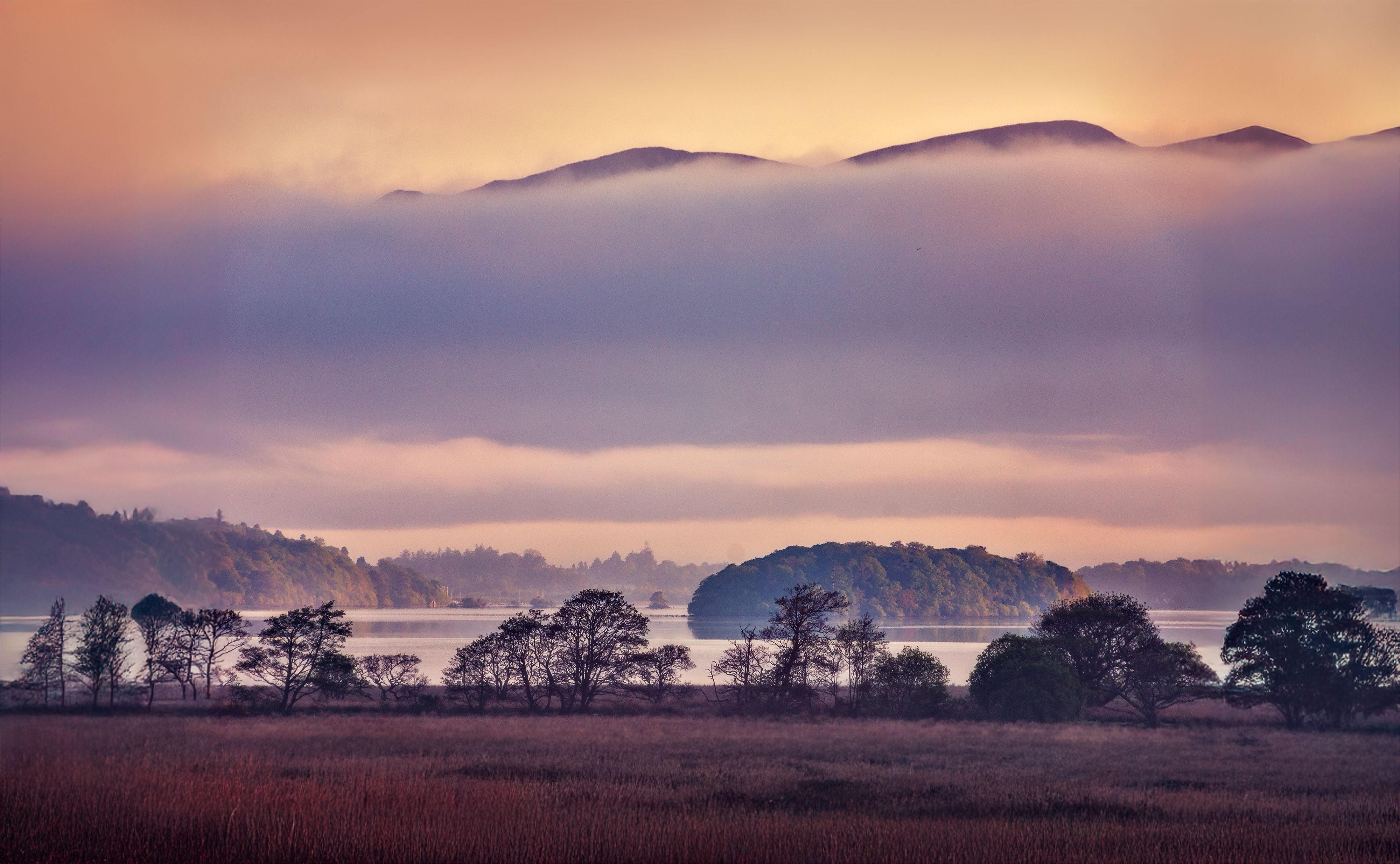 Serene Lake View with Misty Mountains · Free Stock Photo