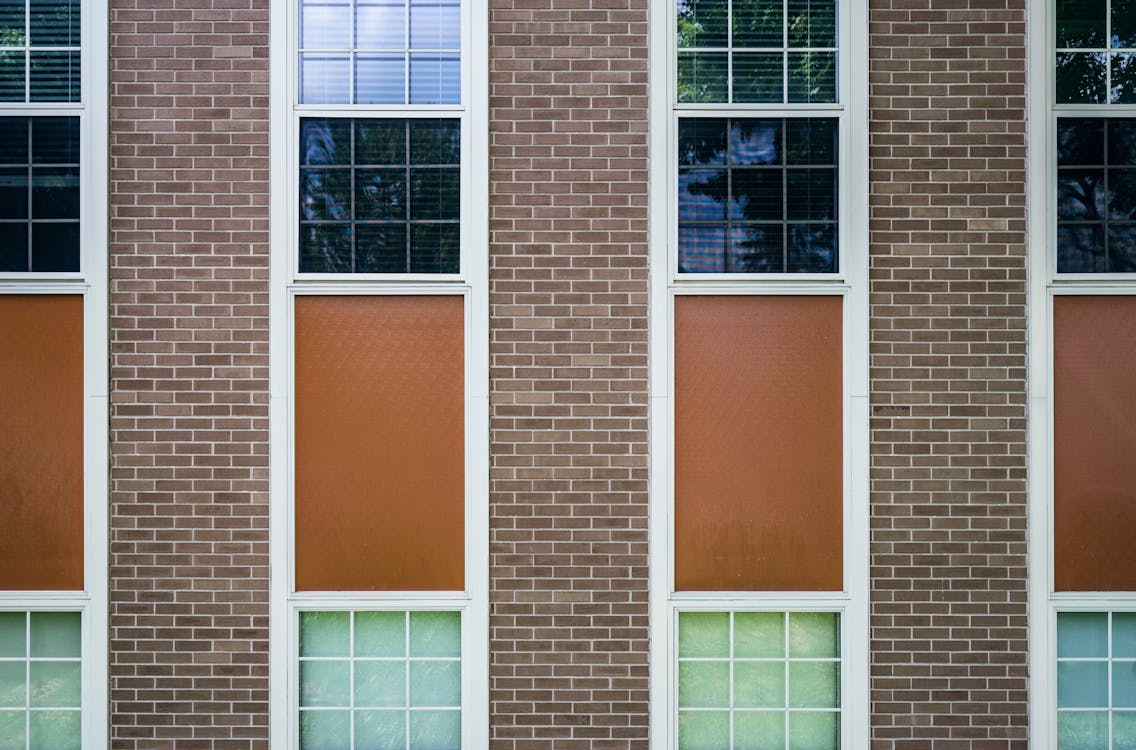 Free Building Windows With White Wooden Frames Stock Photo