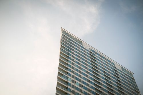 Free A modern skyscraper in Bratislava, Slovakia under a clear summer sky. Stock Photo