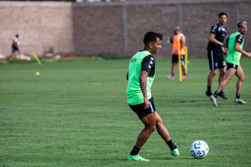 Free Athletes practicing on the soccer field during daytime training session. Stock Photo