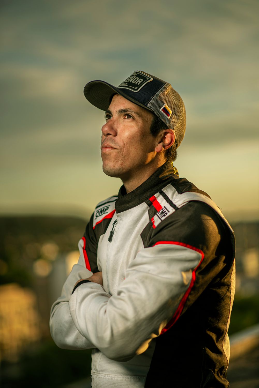Portrait Racing Driver Official Racing Driver Posing at Sunset · Free Stock Photo