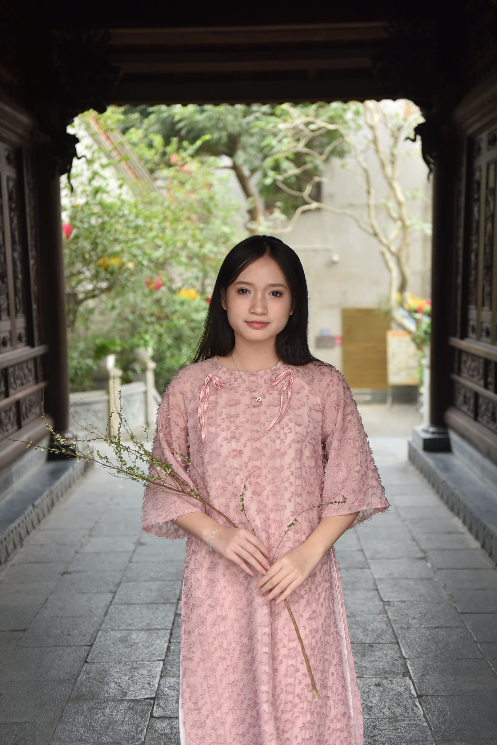 Young Woman in Traditional Pink Dress Outdoors · Free Stock Photo