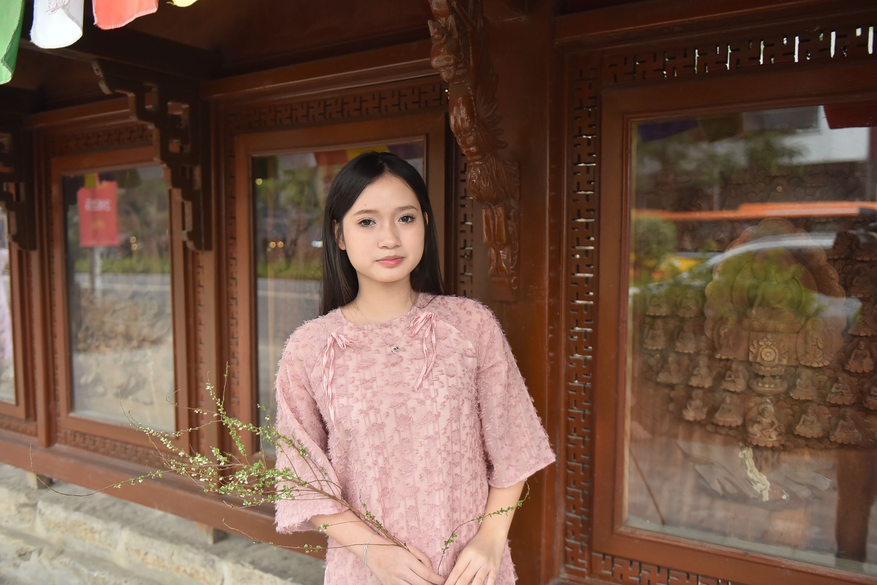 Young Woman in Traditional Asian Setting · Free Stock Photo