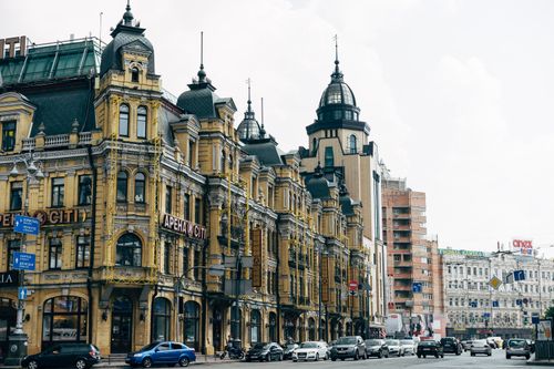 Free A stunning view of historic architecture in central Kyiv, showcasing elegant facades and vibrant city life. Stock Photo